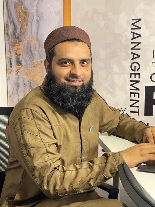 Muhammad Waqar at his desk